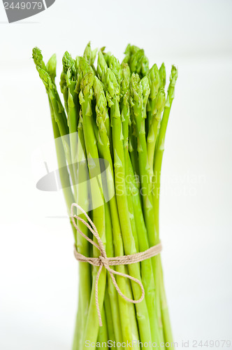 Image of fresh asparagus over white