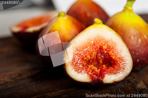 Image of fresh figs over old wood