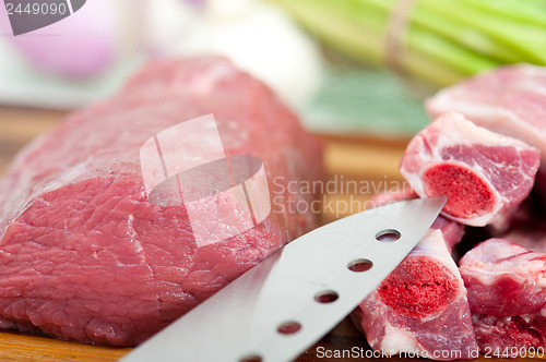 Image of raw beef and pork ribs