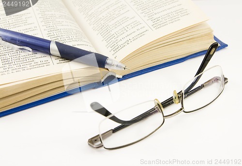 Image of book and glasses