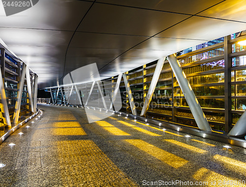 Image of Empty modern pedestrian pathway at night