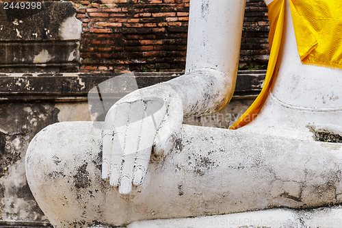 Image of Part of the white ancient buddha statue
