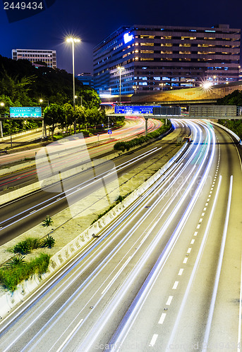 Image of Traffic trail on highway at night