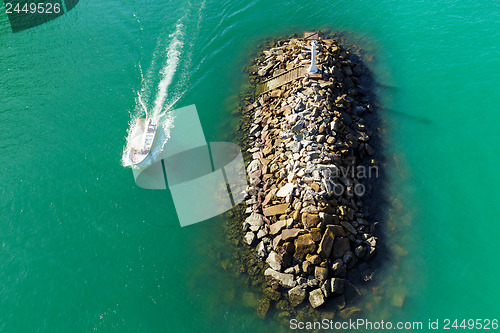 Image of Wave breaker stone with ship