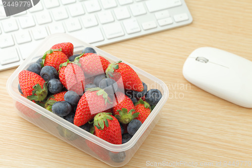 Image of Healthy lunch box in working desk