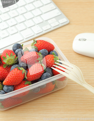 Image of Healthy lunch box in working desk