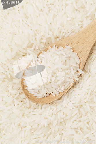Image of White rice on teaspoon