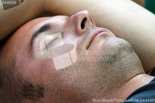 Image of Unshaved and sleeping