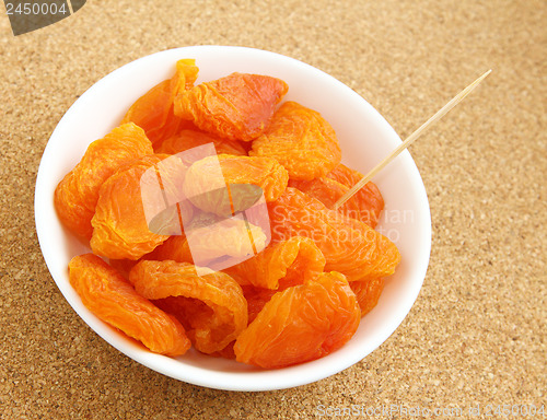 Image of Dried apricots with toothpick