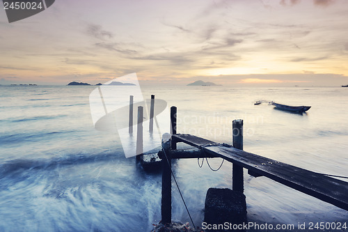 Image of Wooden jetty during sunset