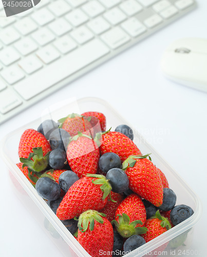 Image of Healthy lunch box in working desk