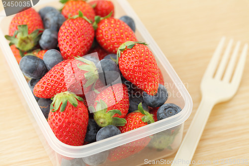 Image of Strawberry and blueberry mix in plastic box