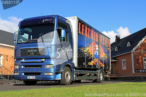 Image of Blue Man Delivery Truck