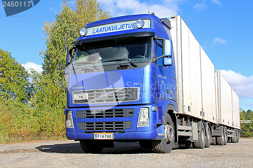 Image of Blue Volvo FH Truck with Full Trailer