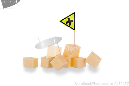 Image of Pieces of cheese isolated on a white background