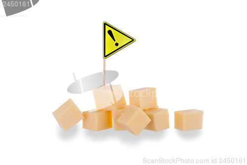 Image of Pieces of cheese isolated on a white background