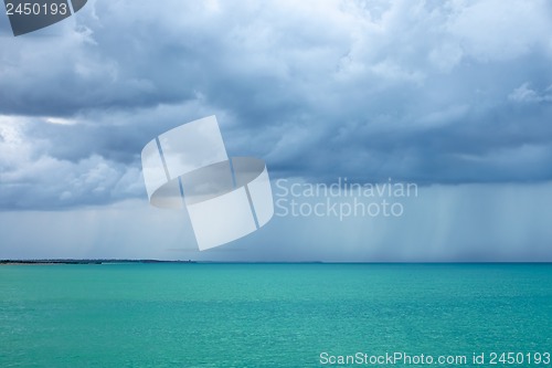 Image of Cumulonimbus clouds over the turquoise sea