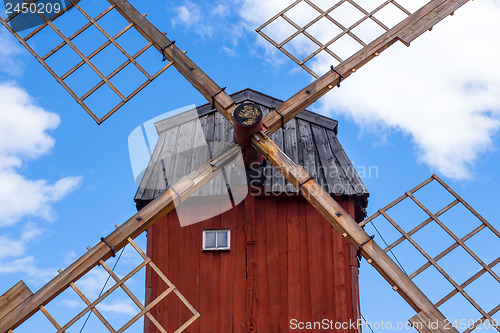 Image of Red wooden windmill