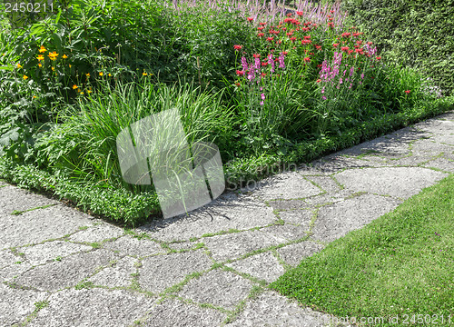 Image of Stone paths in a sunny garden