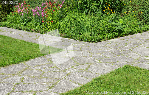 Image of Stone paths crossing in a garden