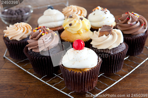 Image of Cupcakes Iced on Cooling Rack