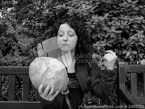 Image of Girl eating bread