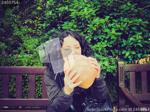 Image of Girl eating bread