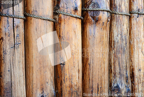 Image of A fence made of logs.