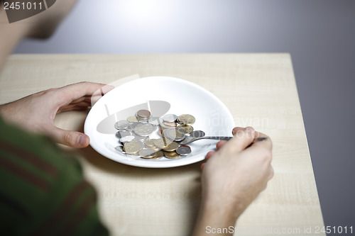 Image of Eating some coins