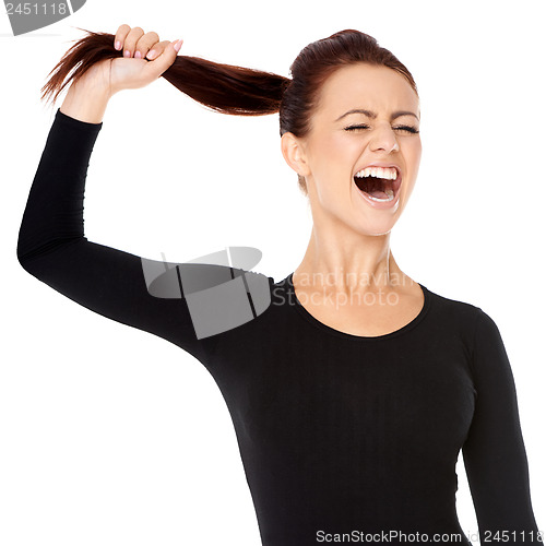 Image of Woman fed up with long hair screaming