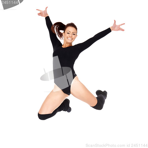 Image of Agile woman leaping in the air