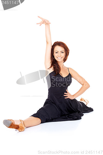 Image of Supple fashionable woman doing the splits