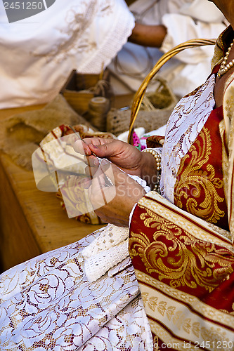 Image of Sewing woman