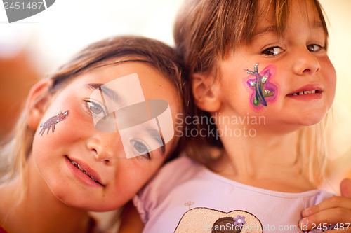 Image of Cute Girls Showing Their Face Painting At A Party