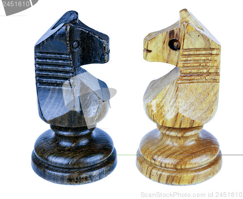 Image of two chess horse faced