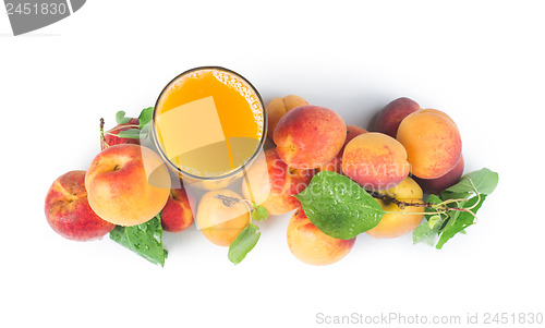 Image of Apricots and glass juice.