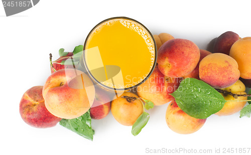 Image of Apricots and glass juice.