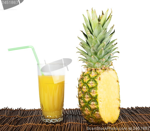 Image of Pineapple and glass of juice