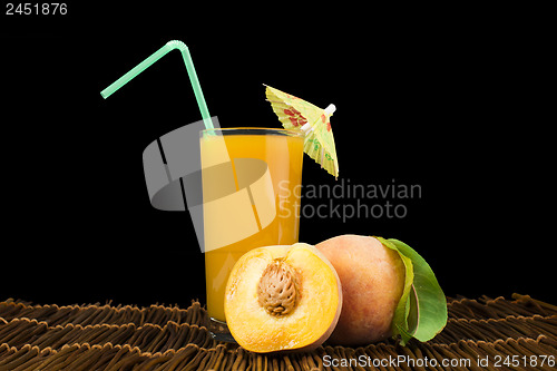 Image of Peaches and glass with juice