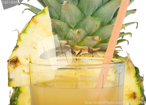 Image of Pineapple and glass of juice