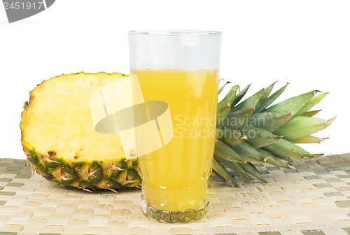 Image of Pineapple and glass of juice