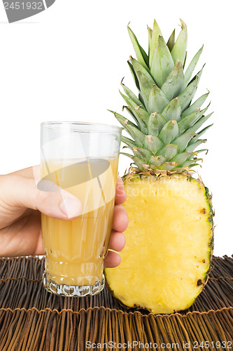 Image of Pineapple and glass of juice