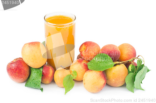 Image of Apricots and glass juice.