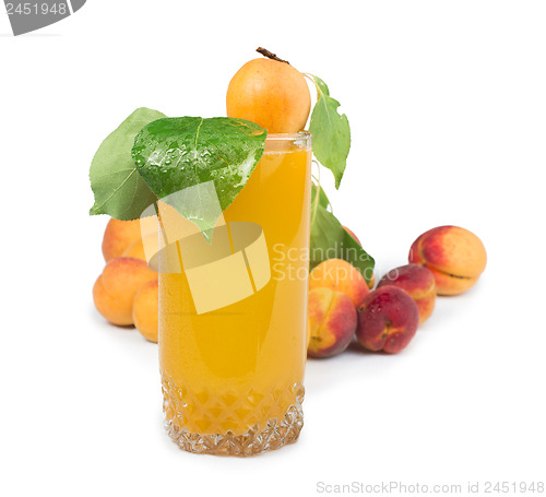 Image of Apricots and glass juice.