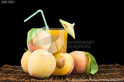 Image of Peaches and glass with juice