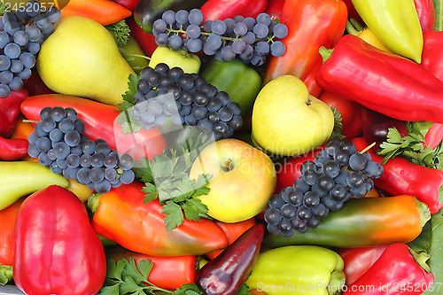 Image of A lot of various fruits, red , yellow and green pepper.