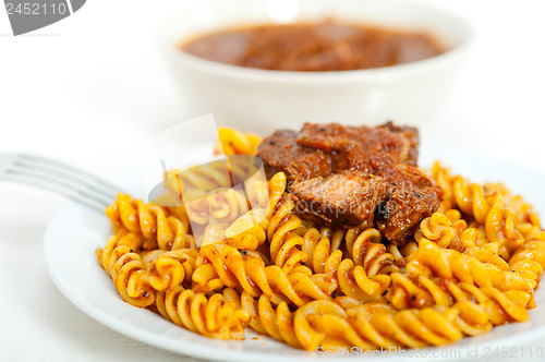 Image of fusilli pasta with neapolitan style ragu meat sauce