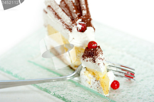 Image of whipped cream and ribes dessert cake slice