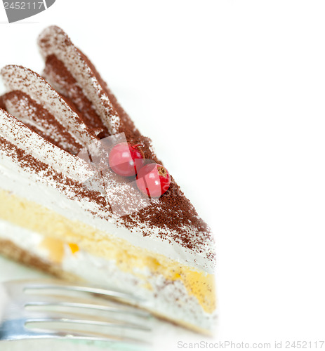 Image of whipped cream and ribes dessert cake slice