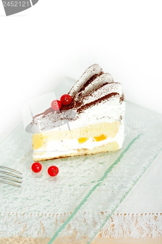 Image of whipped cream and ribes dessert cake slice